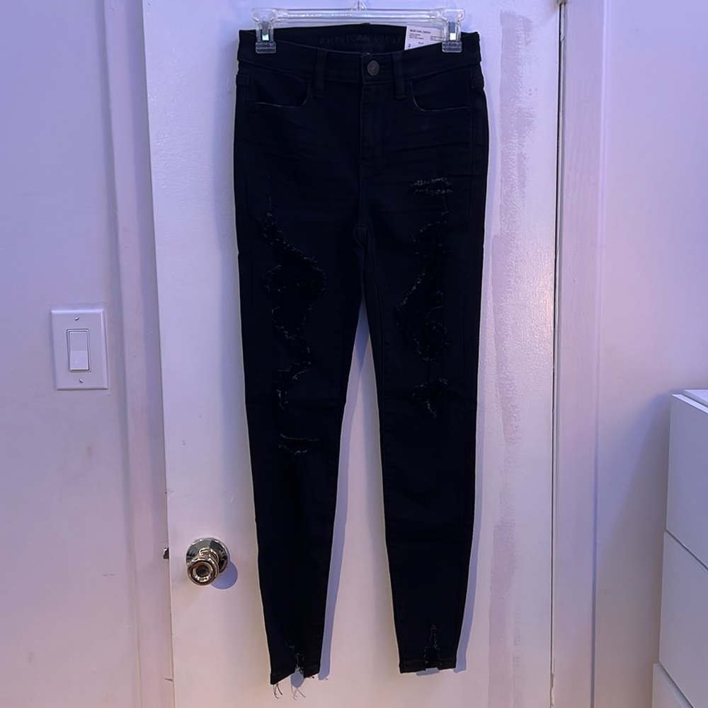 Never worn American Eagle high-rise ripped jegging size 2